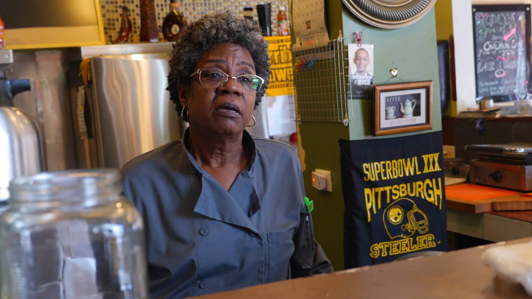 The cook behind the counter