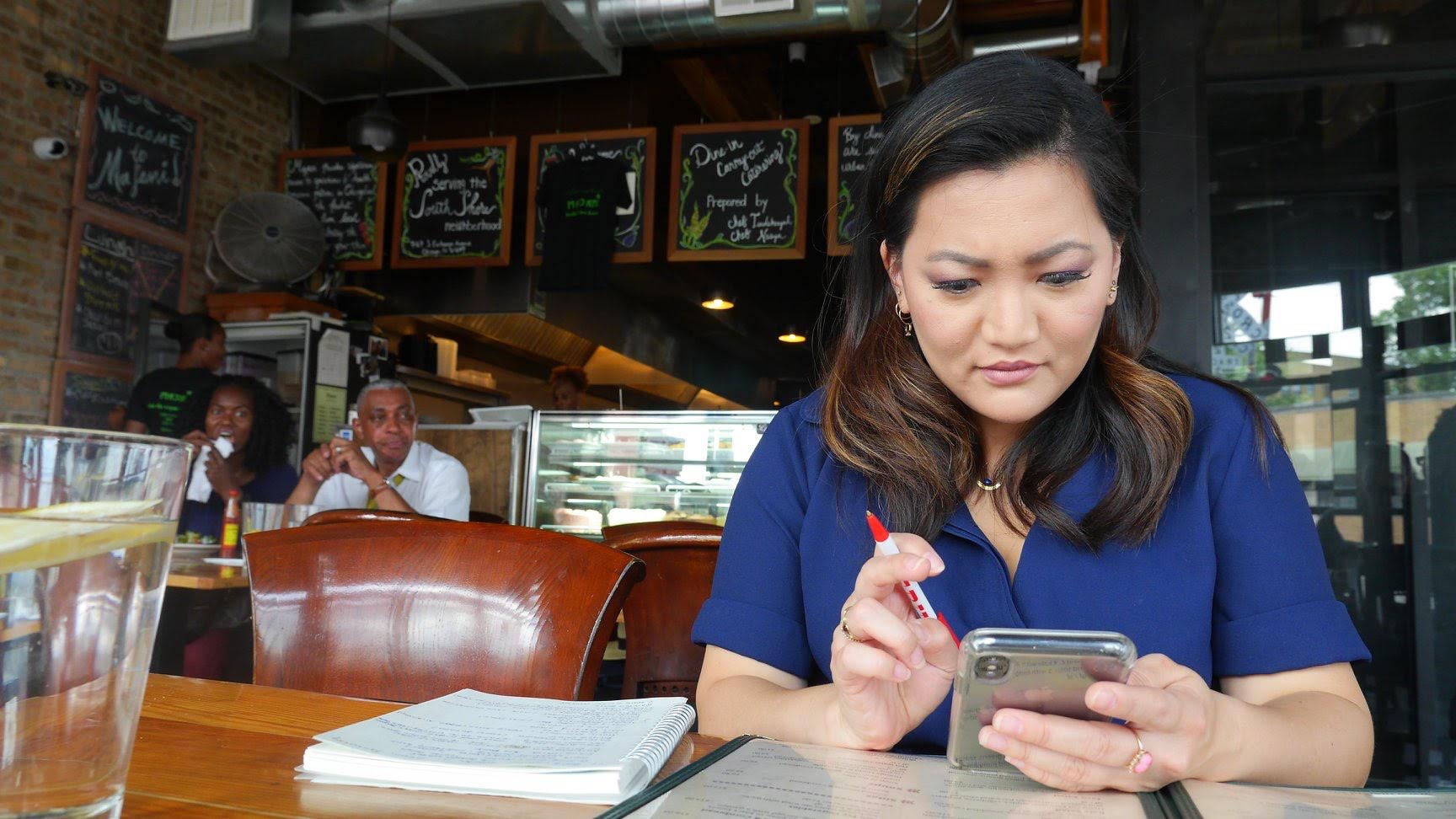 Ji sitting in a diner on the southside