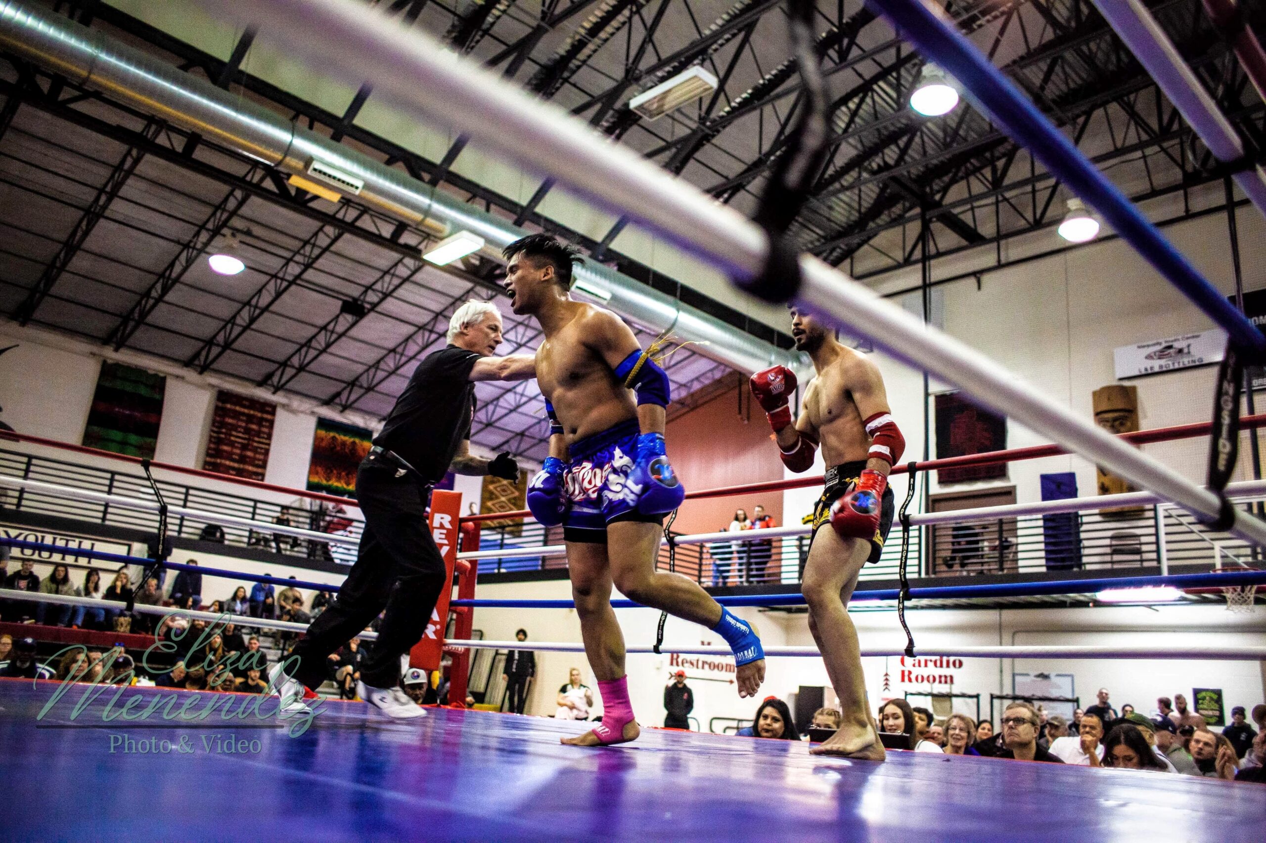 James yells in victory in the ring after the bell ends the fight.